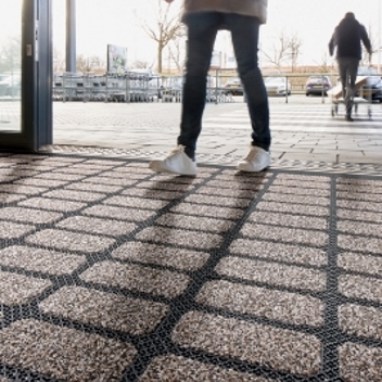 Coral Click Fast Flooring barrier matting in a shop entrance area